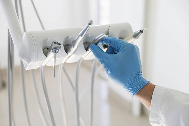 Professional Tooth Extraction technician working in Liberty, NC